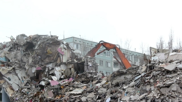 Demolition Of Building In Urban Environments With Heavy Machinery