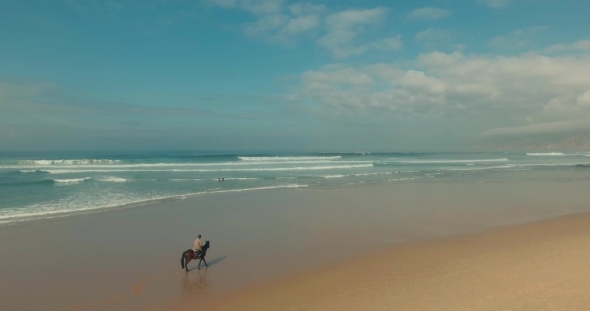 Horse Rider On The Beach