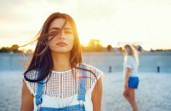 Wind blowing through hair of beautiful woman