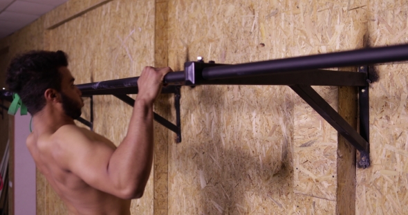 Man In Gym Sport Exercising Guy Pulling At Horizontal Bar Crossfit Training, Sportsman Working Out alt