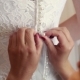 Getting Ready For Wedding Ceremony. Mother Or Bridesmaid Helping Young Bride To Dress Up Bridal - VideoHive Item for Sale