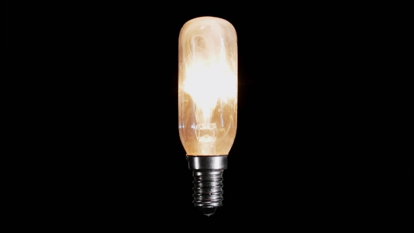 Light Bulb Lamp Flickers And Burns Out With Flame Over Black Background