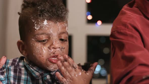 Untidy Boy Smeared in Cake. alt