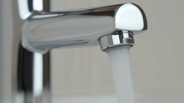 Strong Water Pressure Flowing From a Chrome Tap, Stock Footage | VideoHive