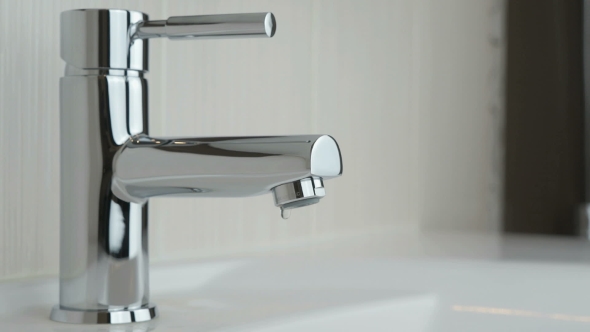 Drops Of Water Seep Through The Water Faucet alt