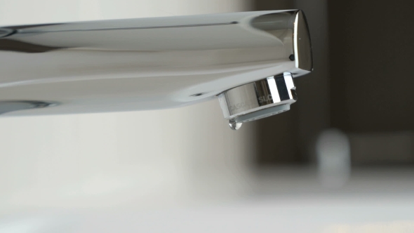 Drops Of Water Seep Through The Water Faucet alt