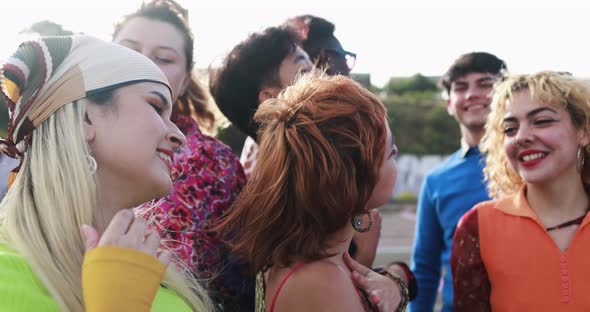 Happy young people dancing outdoor at festival event - Party and entertainment concept alt