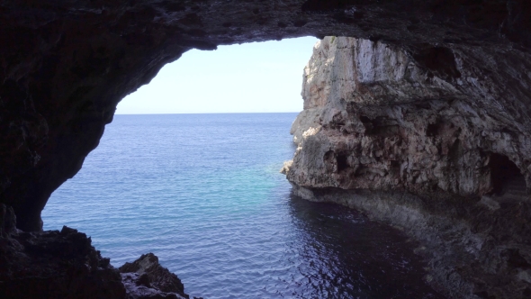 Cave In Montains On Sea Shore