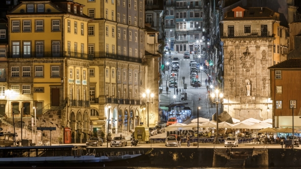 Traditional Quaint Houses In The Old, Vintage And Touristic Ribeira District Of Porto At Night alt