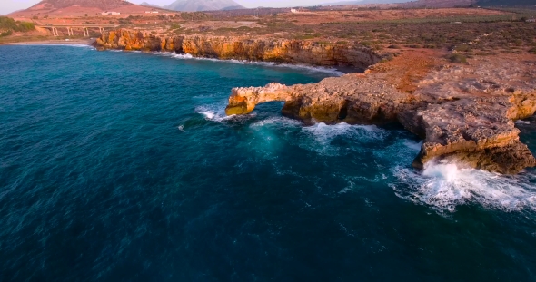 Beautiful Seashore With Clifs At Sunset