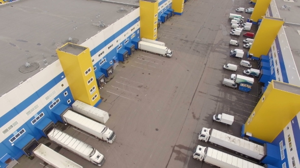 aerial view of the Distribution Warehouse With Trucks Of Different Capacity