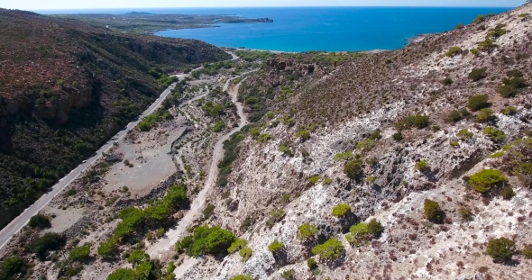 Road Through Mountains To Sea At Crete Greece