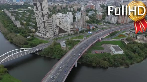 Aerial View of Highway, Bridge, River and City