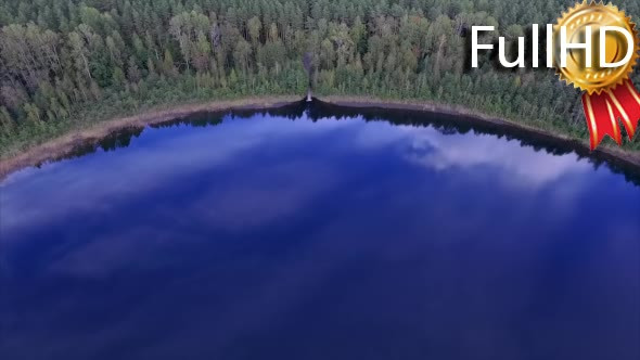 Aerial View on Beautiful Round Lake in a Forest