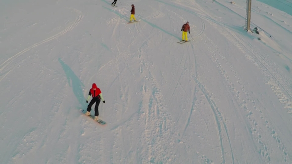 Aerial View of Skiers and Snowboarders alt