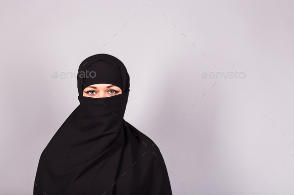 Beautiful Muslim girl wearing burqa closeup Stock Photo by Satura_