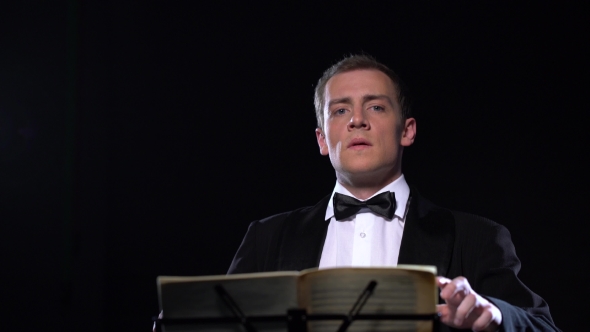 Conductor of Orchestra at Work,  View alt