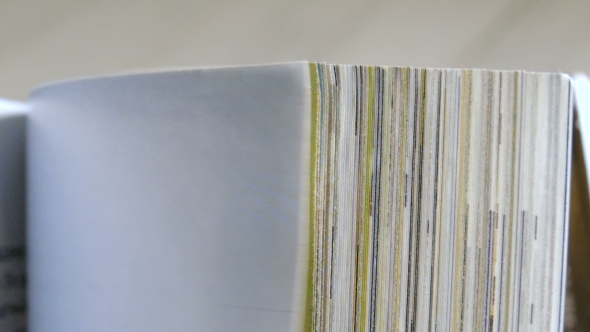 Turning Pages Of A Magazine., Stock Footage | VideoHive