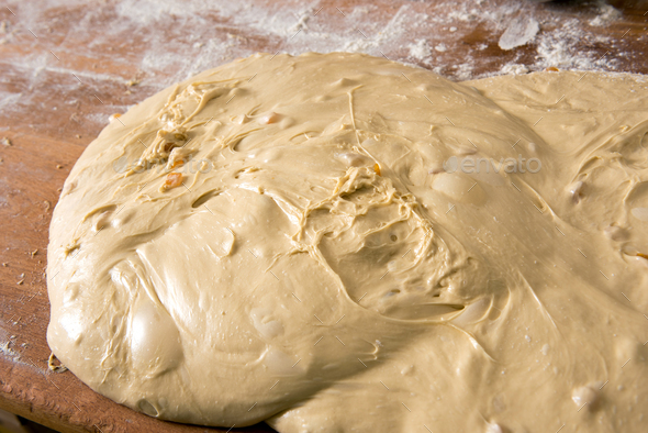 Mound of pastry dough on a floured table