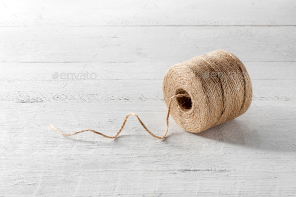 Reel of domestic coarse brown twine Stock Photo by Photology75