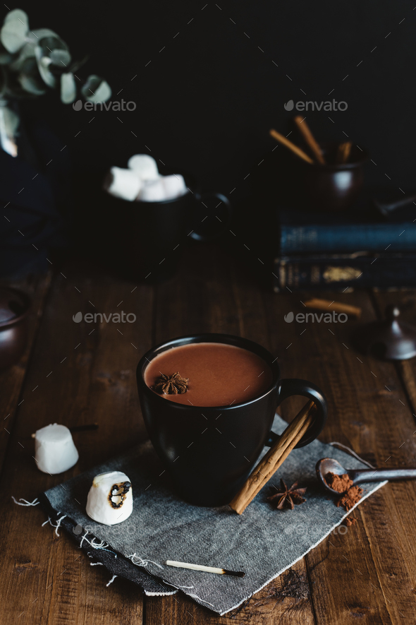 Mug of Hot Cocoa with Marshmallows and Cinnamon Sticks on Rustic Table - Stock Photo - Images