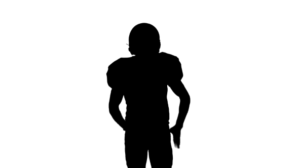 Football Player Running with the Ball and Throws It To the Side. Silhouette. White Background. Front alt