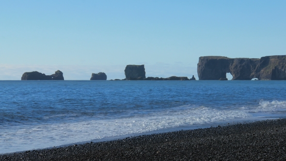 Beautiful Landscape in South of Iceland, Waves of Atlantic Ocean Breaking of Coast