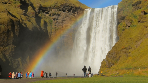 Amazing Rainbow Near the Most Famous Icelandic Waterfall Skogafoss in Sunny Autumn Day