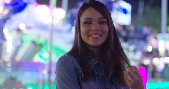 Beautiful Woman at Amusement Park alt