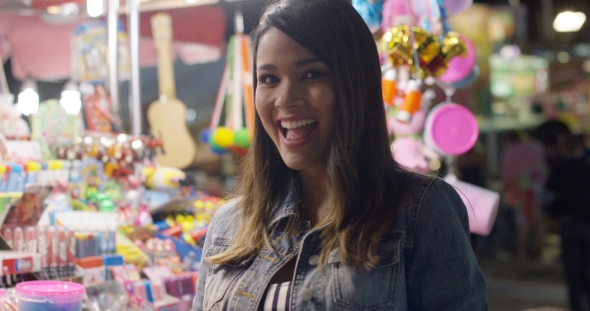 Laughing Woman Near Candy Table alt