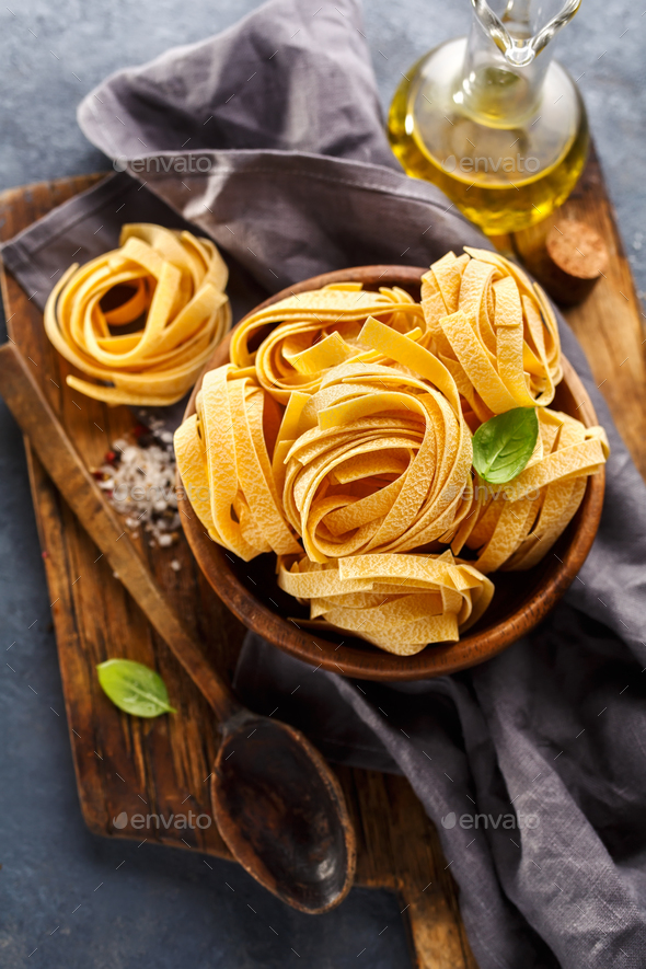 Fettuccine pasta ingredients for Italian food Stock Photo by Vell