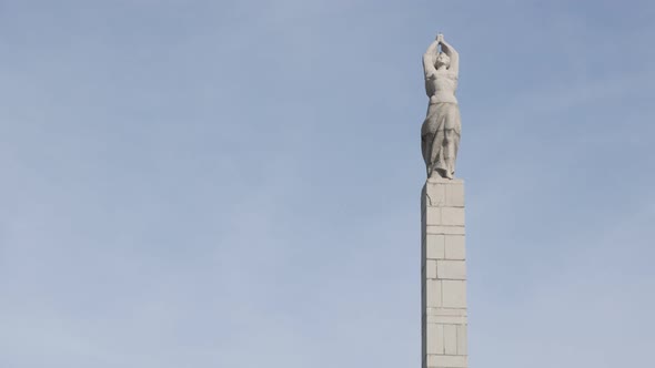 VIDIN, BULGARIA - OCTOBER 10, 2017 Socialism style  monument in Western Bulgarian town slow tilting 