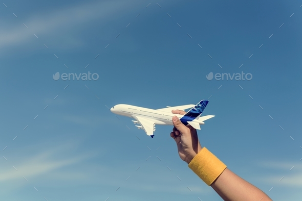 Little Boy Playing Toy Plane Concept