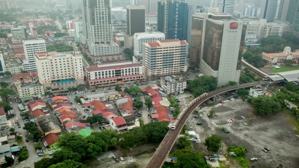 Bird Eye  View of Railways Across Road Against City Landscape. Kuala Lumpur, Malaysia alt