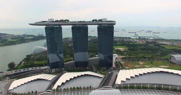 Aerial Footage of Marina Bay Sands with Singapore Seaport Skyline alt