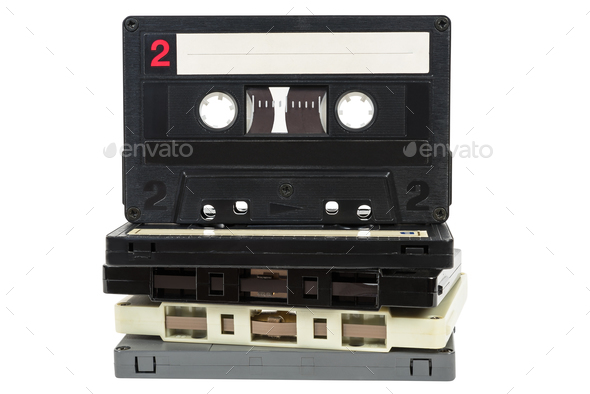 Stack of vintage audio tapes on white background - Stock Photo - Images