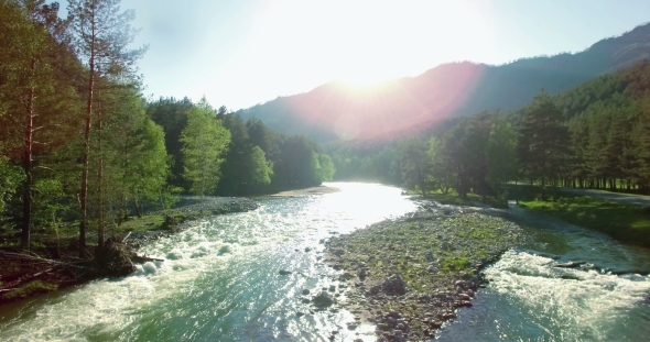 Aerial View. Low Flight Over Fresh Cold Mountain River at Sunny Summer Morning. alt