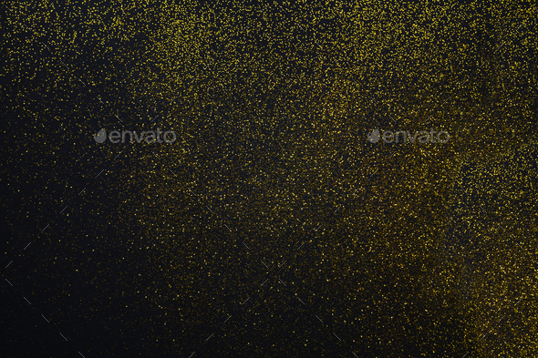 Golden glitter sand texture on black, abstract background. Stock Photo ...