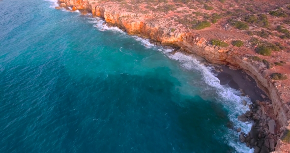 Beautiful Seashore with Clifs at Sunset