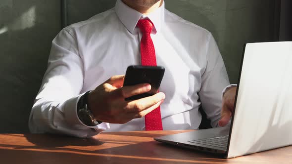 caucasian businessman working with laptop alt