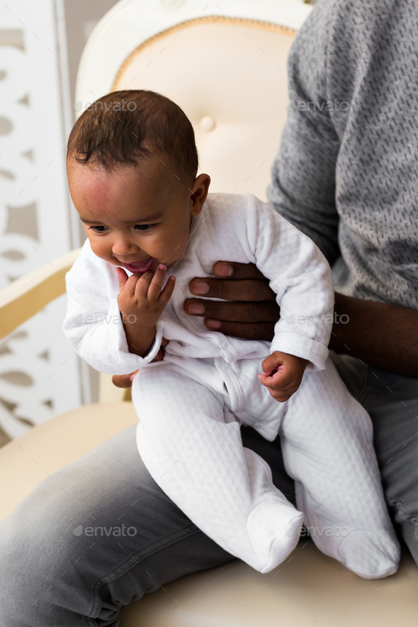 African American Father Playing With mixed race Baby Son - Stock Photo - Images