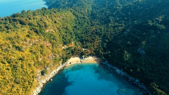 Aerial: Small Wild Nui Beach on Phuket Island.