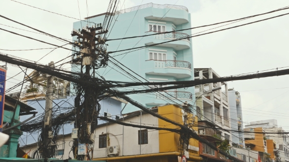 The Web of Power Lines on the Streets of Ho Chi Minh City alt