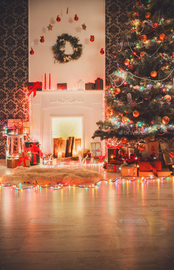 Christmas room interior design, decorated tree in garland lights - Stock Photo - Images