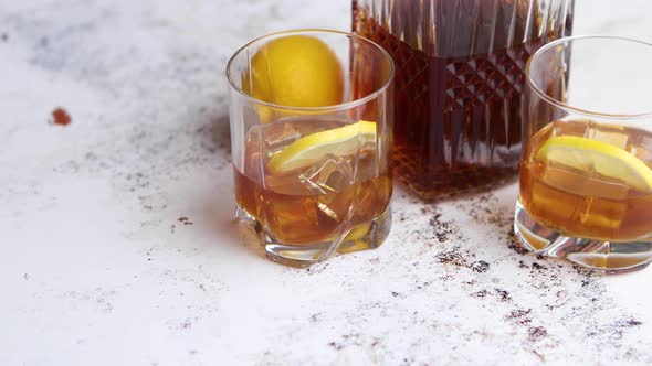 Whiskey Sour Drink with Lemon in Glass on Stone Rustical Background alt