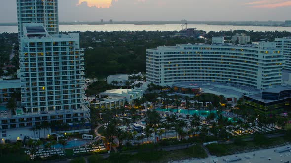 Aerial view of Miami Beach at dusk alt