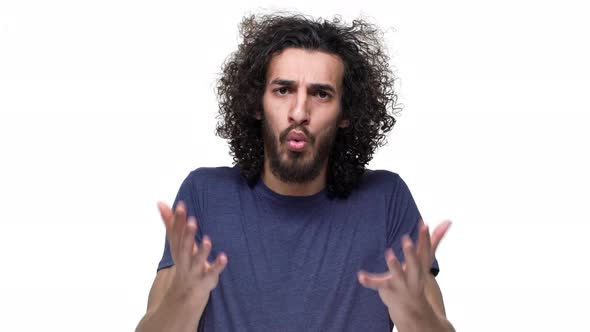 Portrait of Caucasian Annoyed Man in Casual Clothing Being Perplexed Gesturing While Screaming and alt