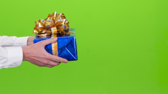 Man Gives a Girl the Shiny Blue Box alt