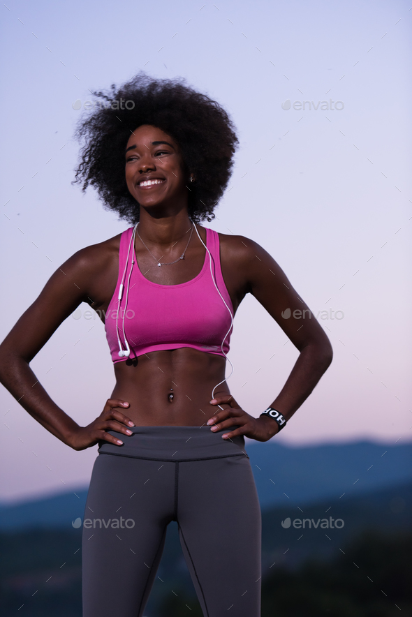 portrait of african american woman jogging in nature