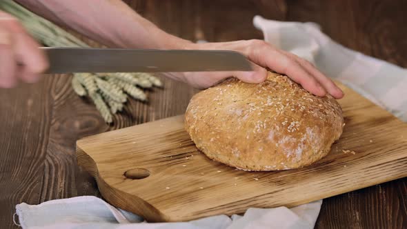 Cutting Fresh Homemade Yeast Free Bread